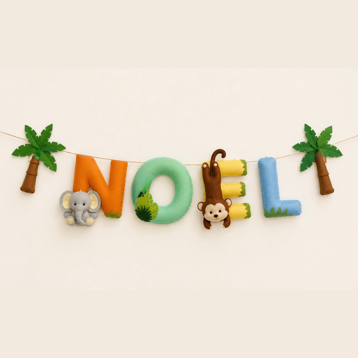 Decorative name garland with 'NOEL' letters and animal figures on a beige background