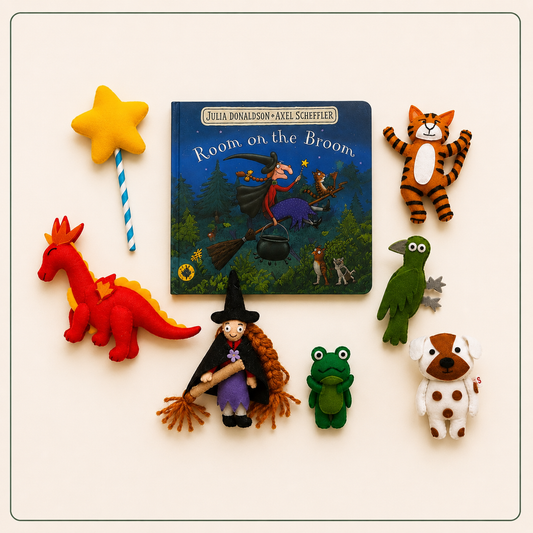 Children's book 'Room on the Broom' with character toys on a white background