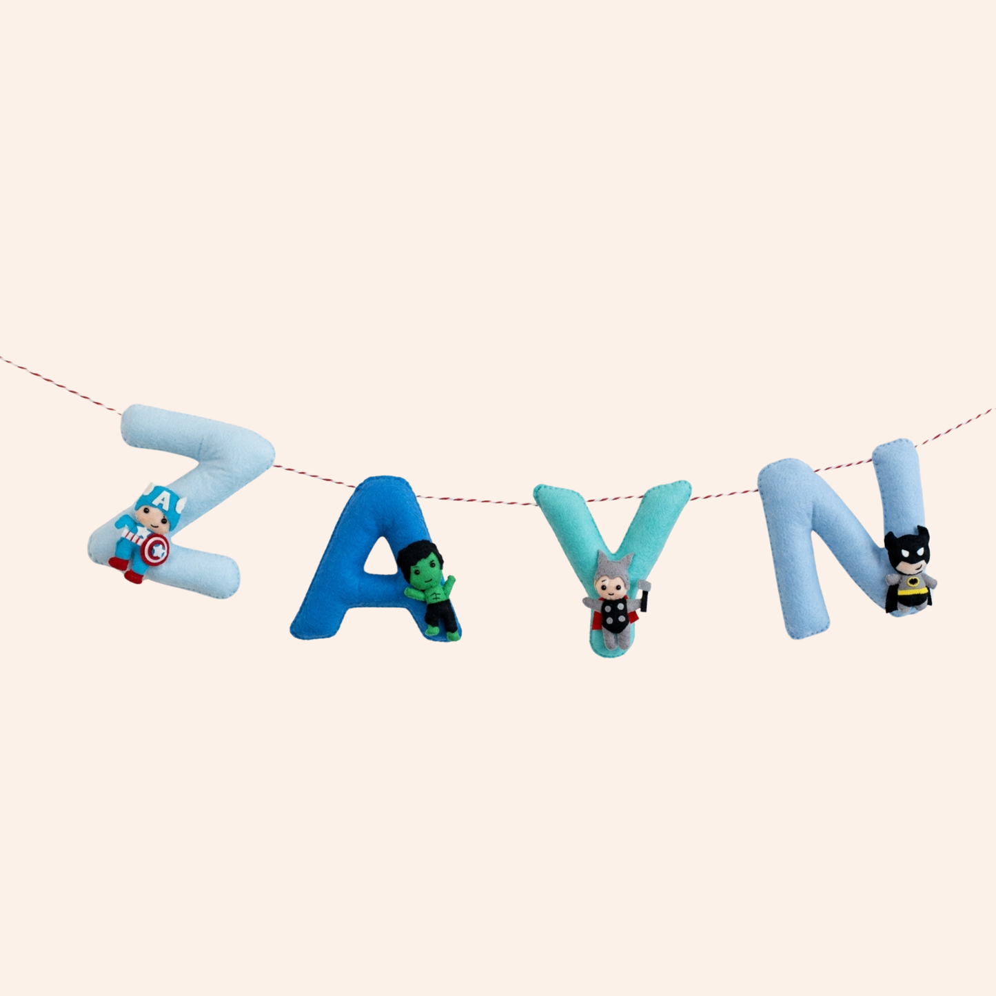 Decorative name banner with superhero characters on a white background